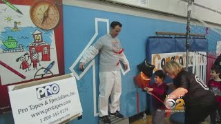 NJ Principal Duct Taped To Wall