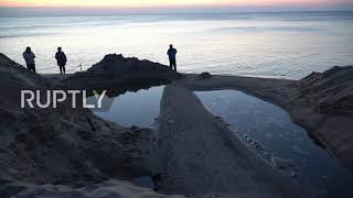 Latvia: "Ghost Ship" carried to shore near Bolderaja beach