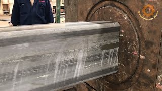 Amazing transformation of a round steel pipe into a square one.
