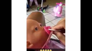 Kid reacts to baby doll