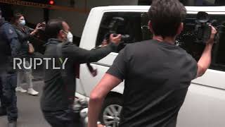 Australia: Detained Djokovic avoids visual contact as convoy leaves lawyer's office